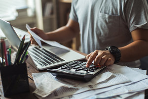 calculating - Copyright – Stock Photo / Register Mark