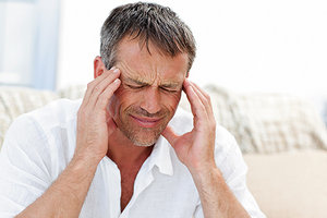 headaches - Copyright – Stock Photo / Register Mark