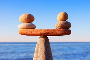 rock balancing - Copyright – Stock Photo / Register Mark