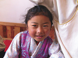 Tibetan girl - Copyright – Stock Photo / Register Mark