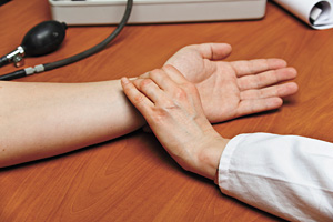 Touching the patient - Copyright – Stock Photo / Register Mark